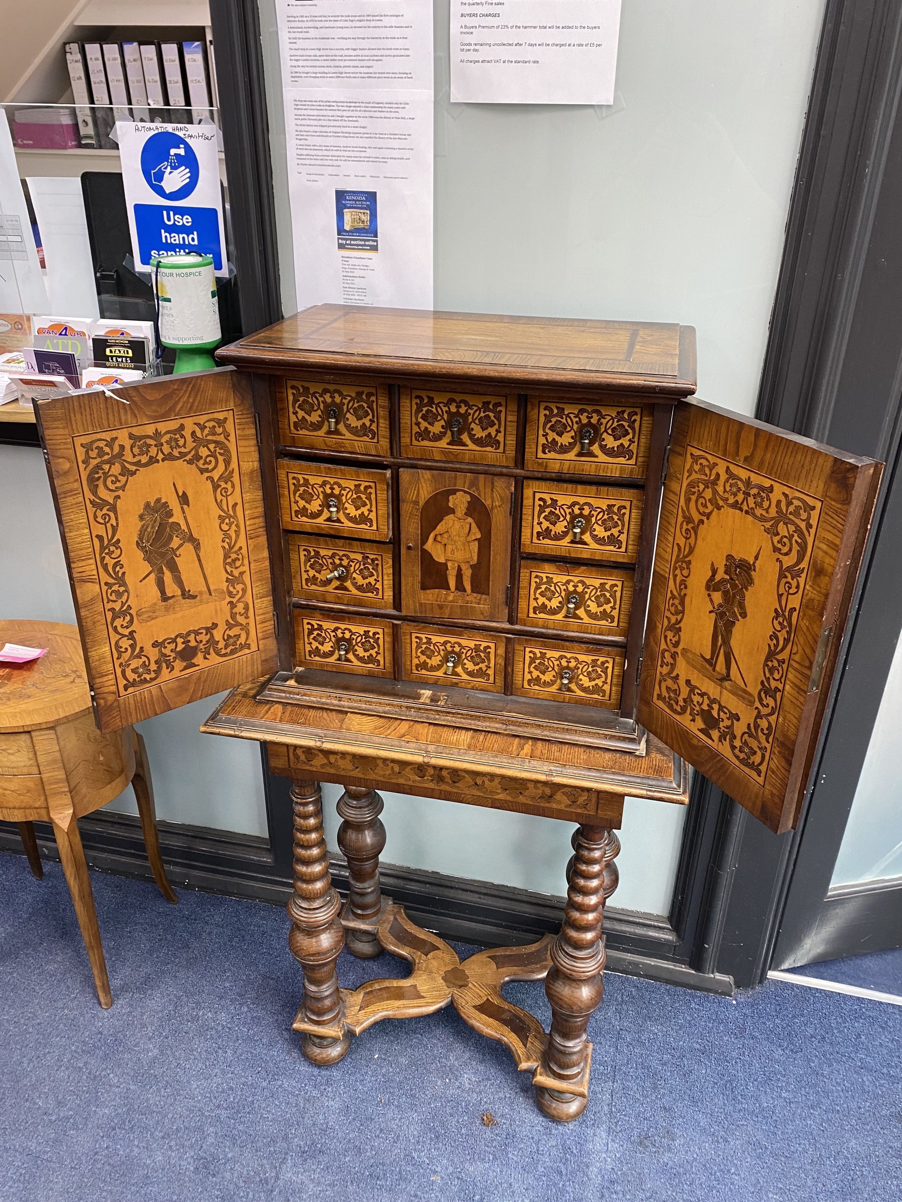 A Continental marquetry cabinet on stand, width 65cm, depth 36cm, height 126cm